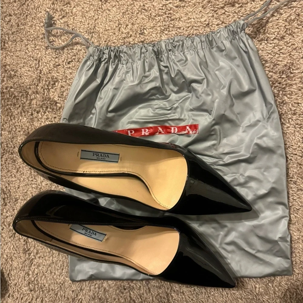 Brand new, without tags. Never worn Prada platform heels.